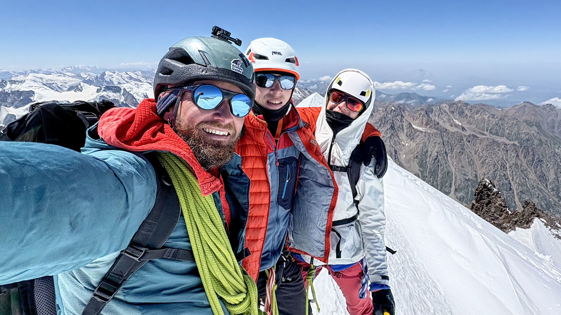 A group of climbers at the summit of Mt. Talgar